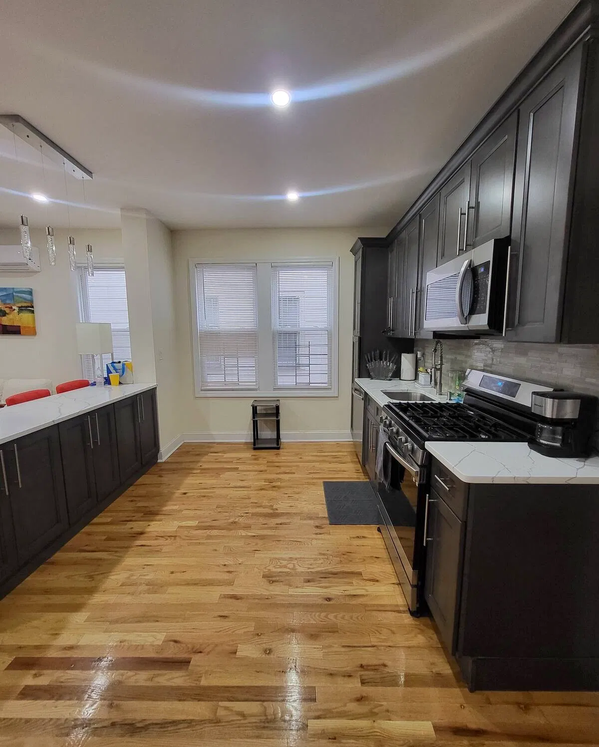 OoohLaLa@Newark — An open kitchen layout with room to prepare meals and settle into a longer stay.